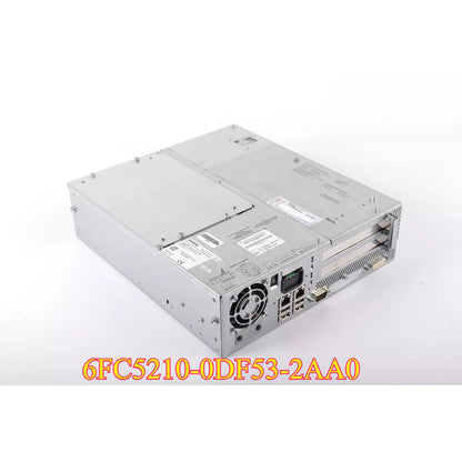 Siemens 6FC5210-0DF53-2AA0 CNC motherboard, industrial automation part, silver metal casing, with various ports and a fan.