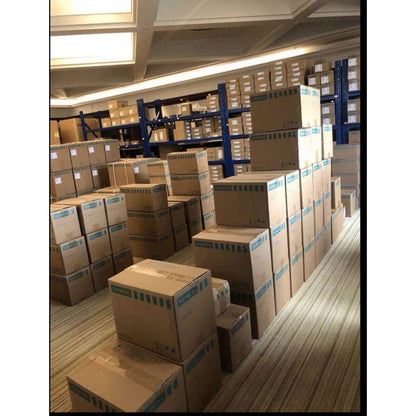 Warehouse stock of Siemens industrial automation parts in boxes, PLC modules, etc.