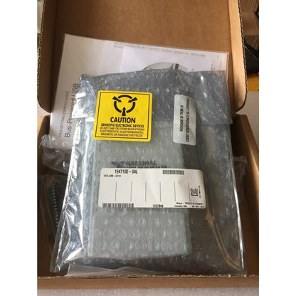National Instruments USB-6210 DAQ device in packaging, with caution label, ready for shipping.