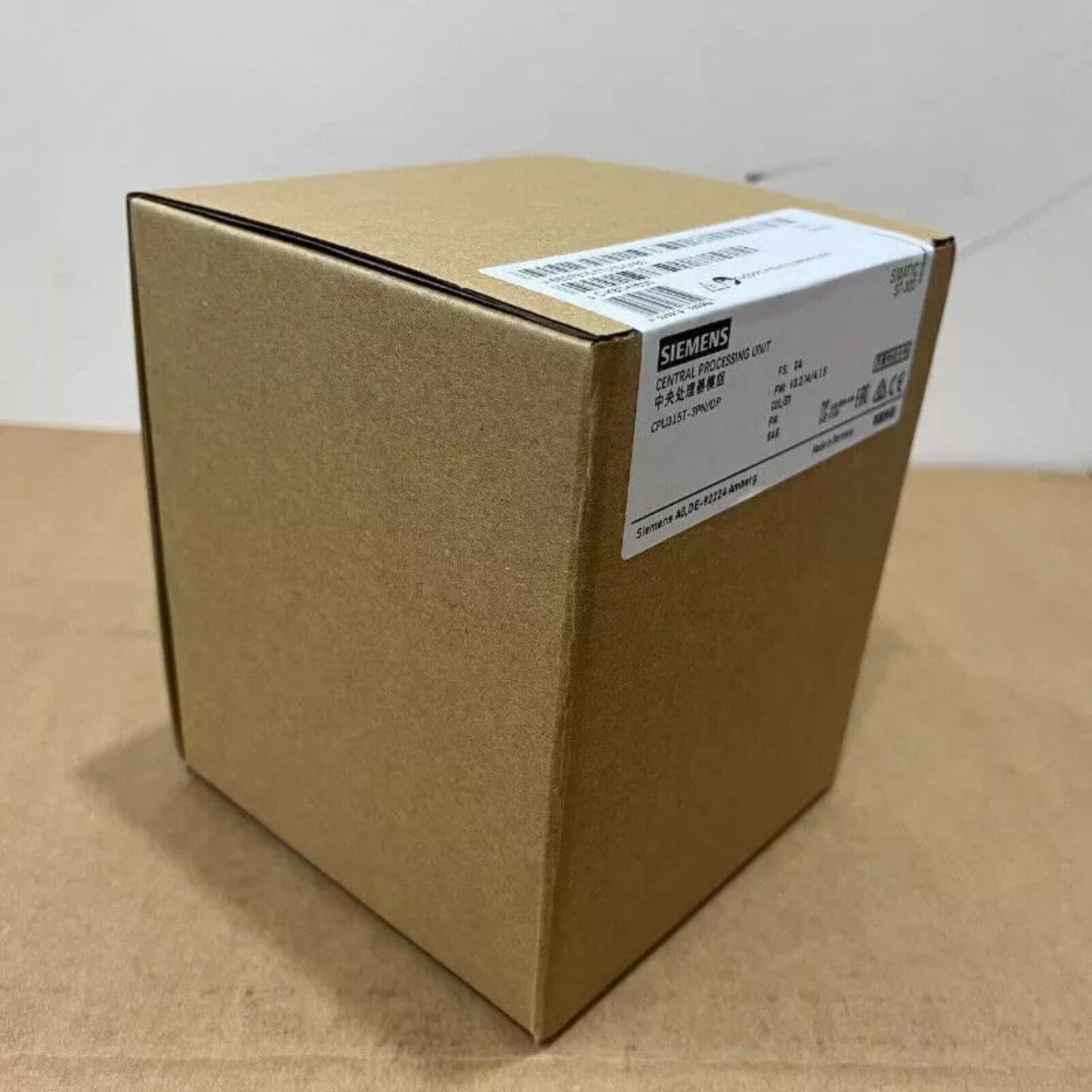 Siemens S7-300 PLC in a brown box, Central Processing Unit.