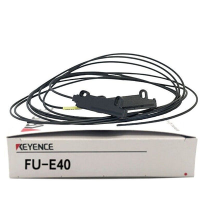 Keyence FU-E40 Fiber Optic Sensor in box. Industrial automation sensor.
