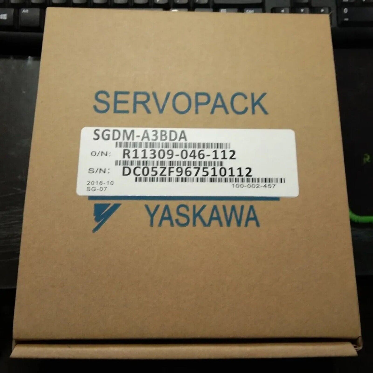 YASKAWA SGDM-A3BDA Servo Drive in box. Industrial automation part with specifications.