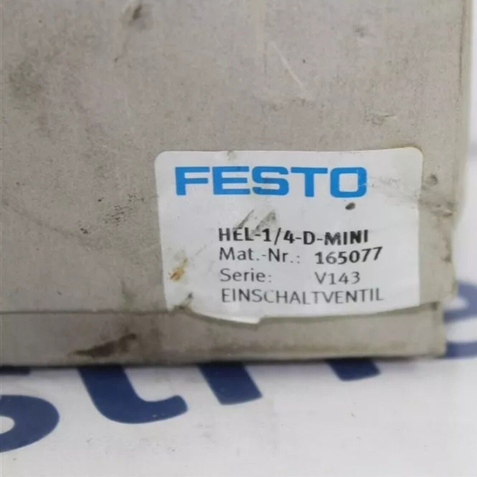 Festo HEL-1/4-D-MINI on/off valve with product details. Industrial automation part.