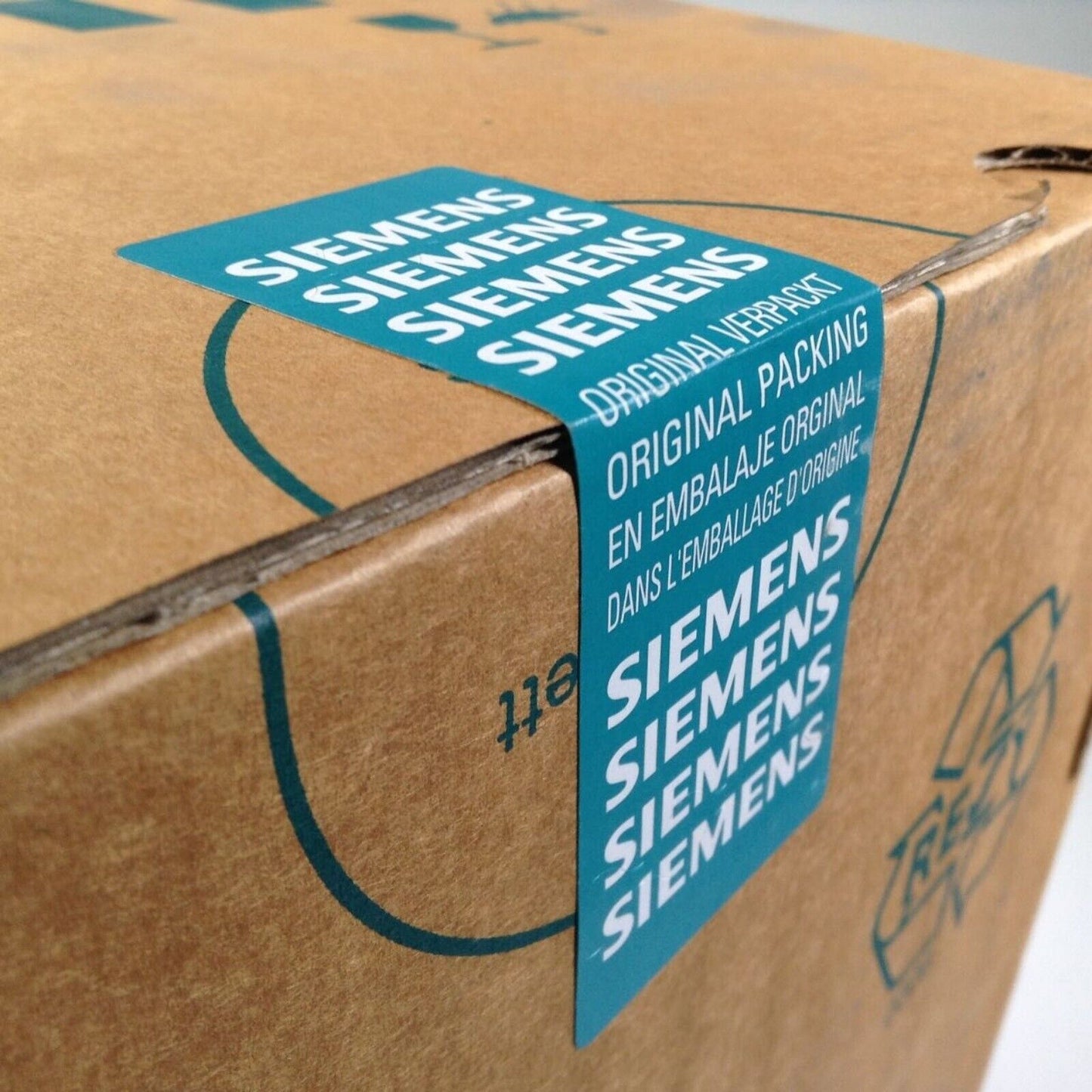 Siemens product box with blue label, original packing, for PLC modules and automation parts.