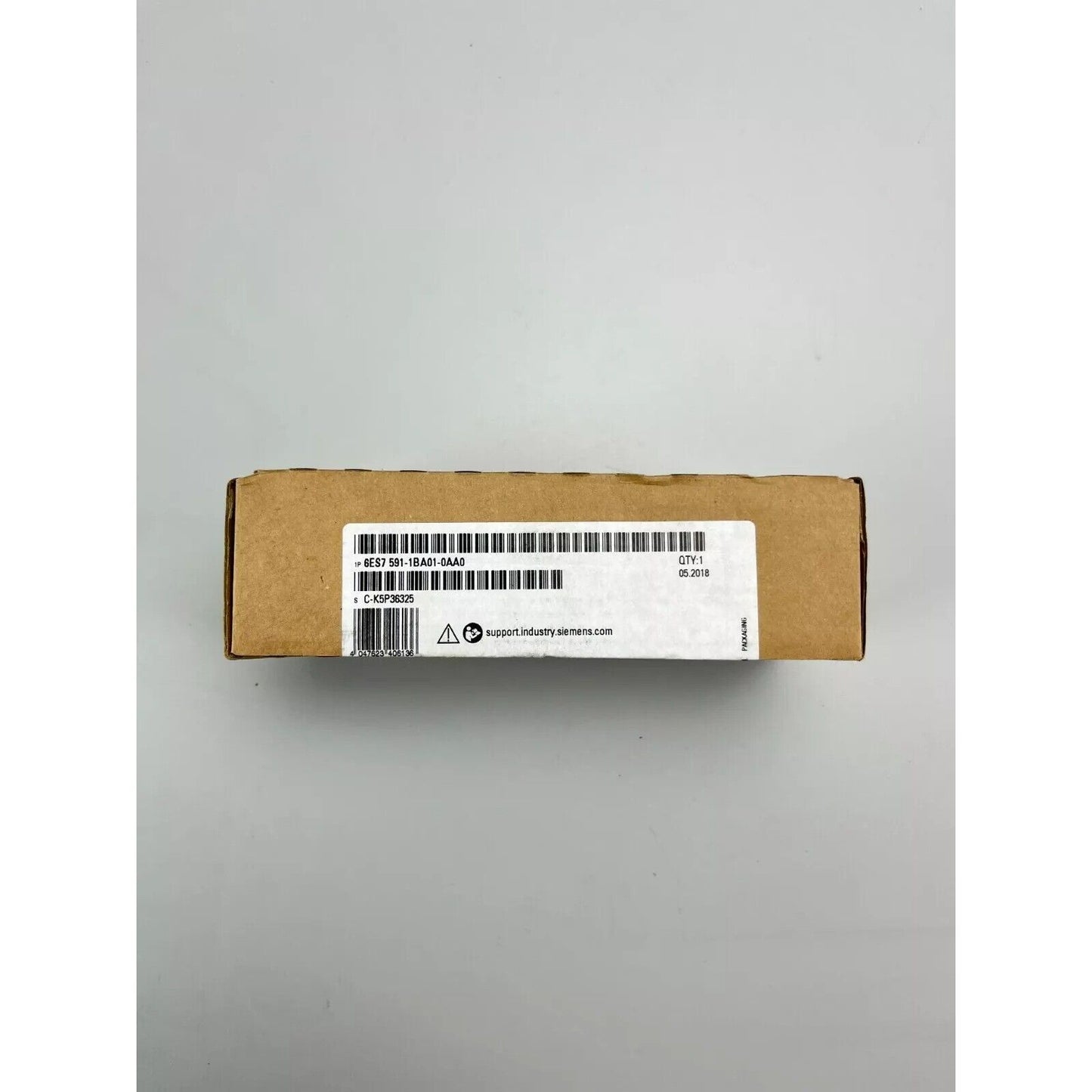 Siemens S7-1500 spare part, 6ES7 591-1BA01-0AA0, brown cardboard packaging, product details, and barcode label.