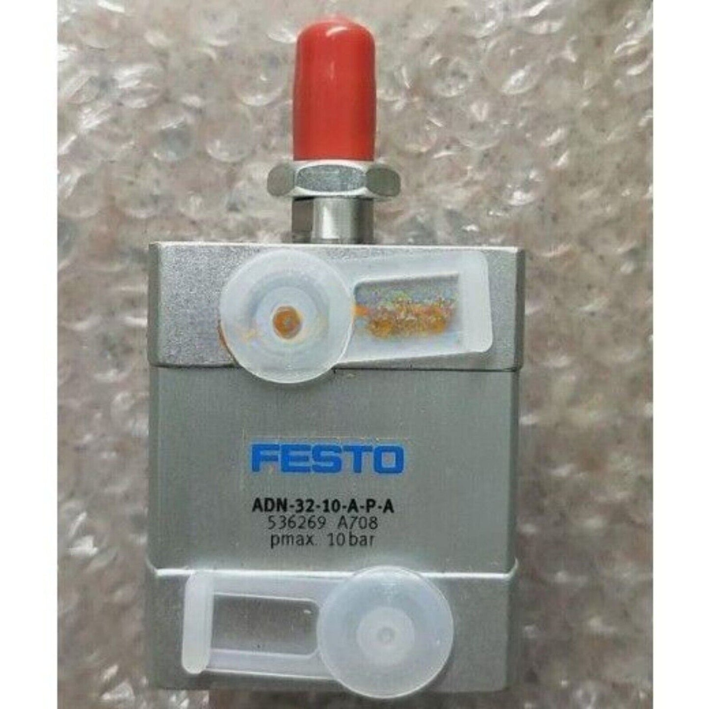 FESTO ADN-32-10-A-P-A 536269 Cylinder. Silver cylinder with red top and white components.