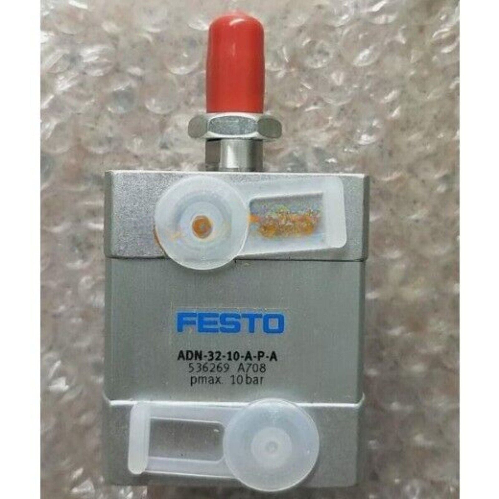 FESTO ADN-32-10-A-P-A 536269 Cylinder. Silver cylinder with red top and white components.