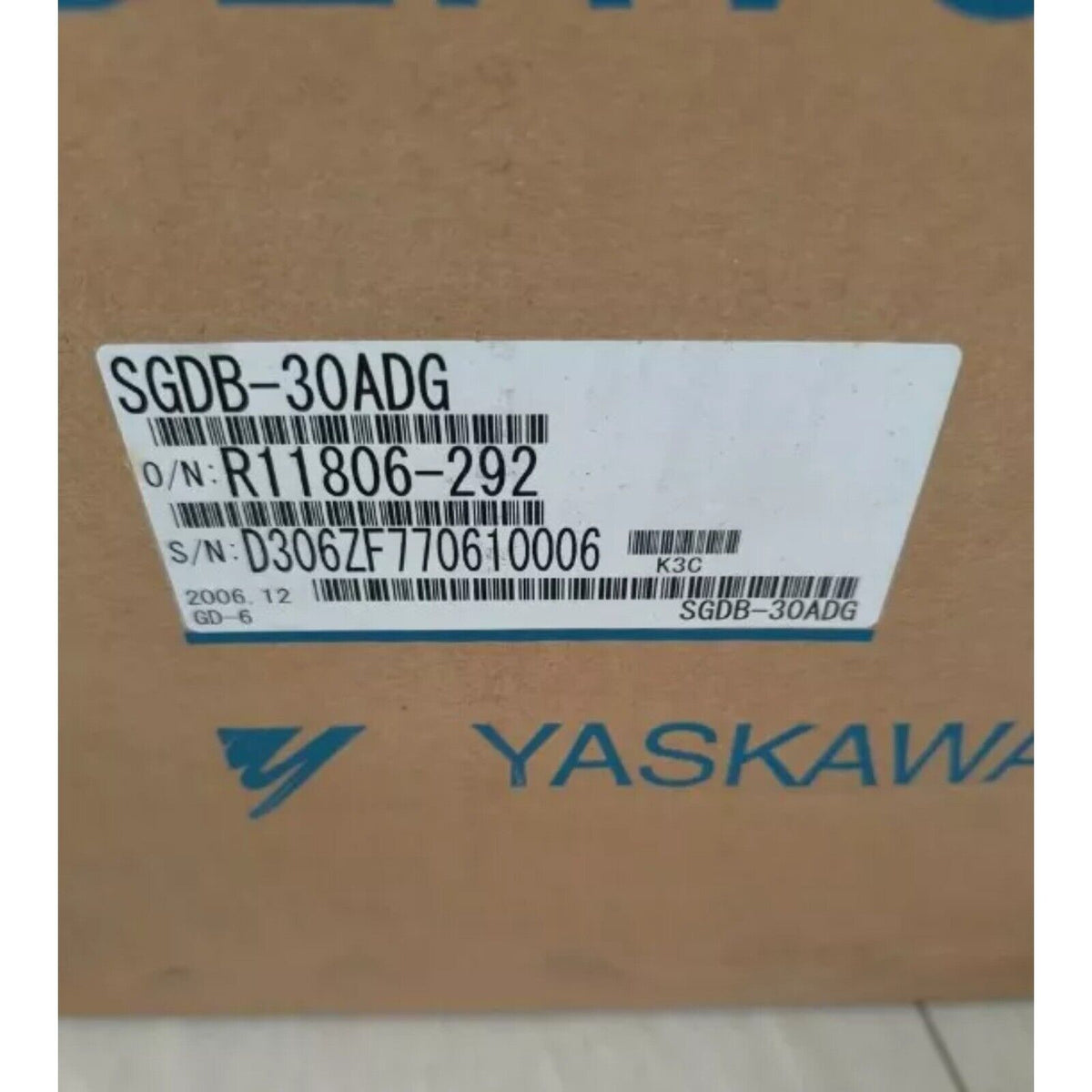 YASKAWA SGDB-30ADG servo drive label detail, featuring model number, serial number, and brand logo