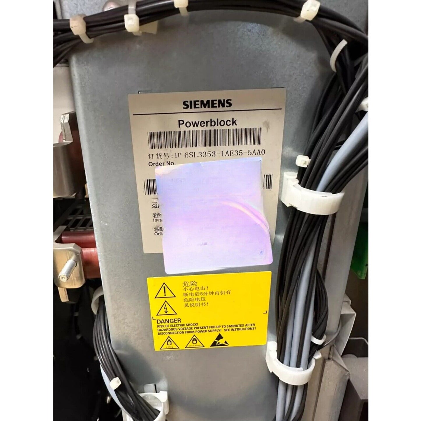 Siemens Powerblock with safety warning labels. PLC industrial automation part.