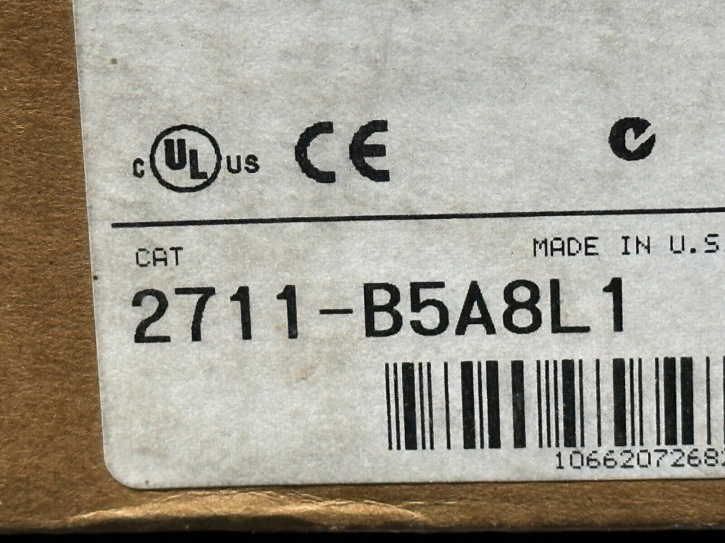 Allen-Bradley 2711-B5A8L1 PanelView 550 product label showing CAT, Made in U.S.A., and barcode.