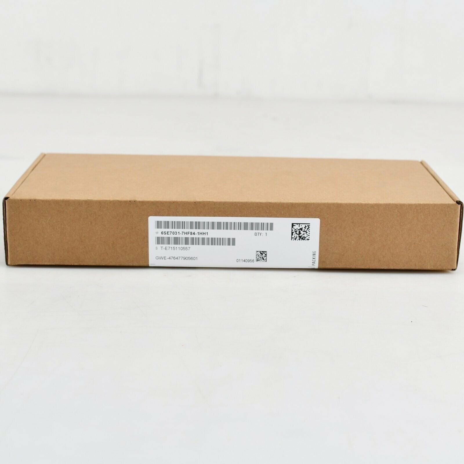 Siemens 6SE7031-7HF84-1HH1 Precharging Module in brown cardboard box, industrial automation part.
