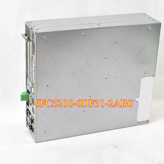 SIEMENS 6FC5210-0DF31-2AB0 PLC module, gray metal case, with green connector, industrial automation part.
