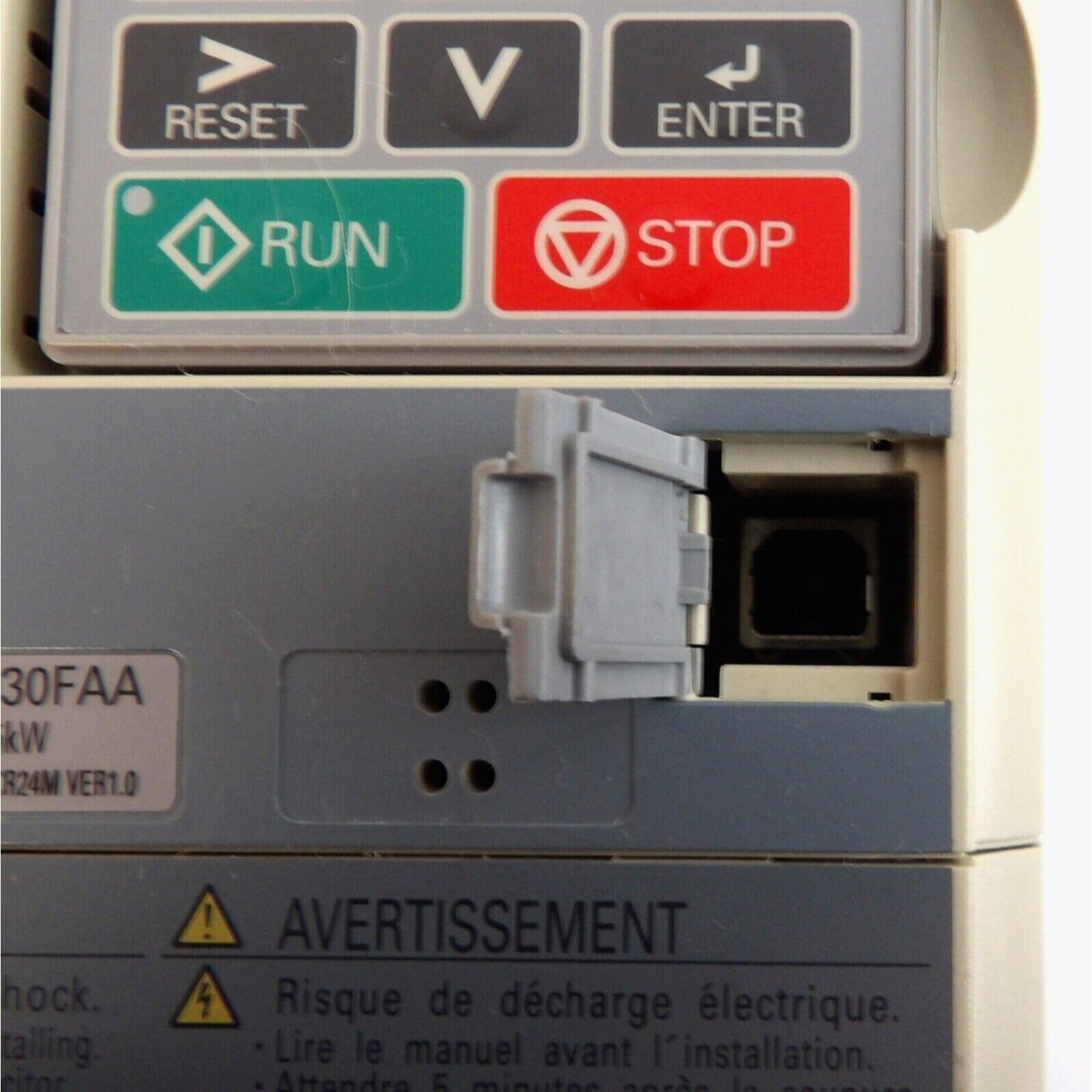 Yaskawa A1000 AC drive control panel with run, stop, reset buttons. Industrial automation inverter.