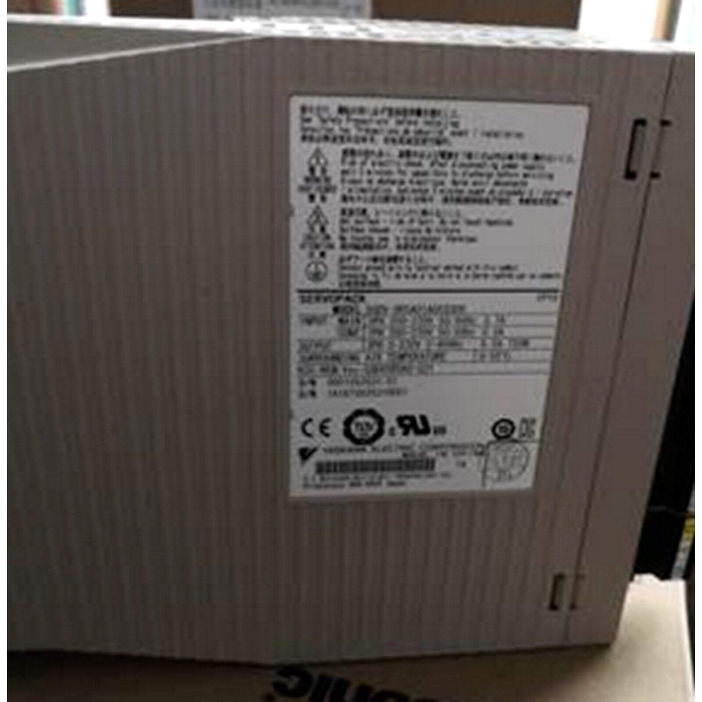 YASKAWA SGDV-5R5A01A002000 Servo Drive, detailed view of the product label and exterior.