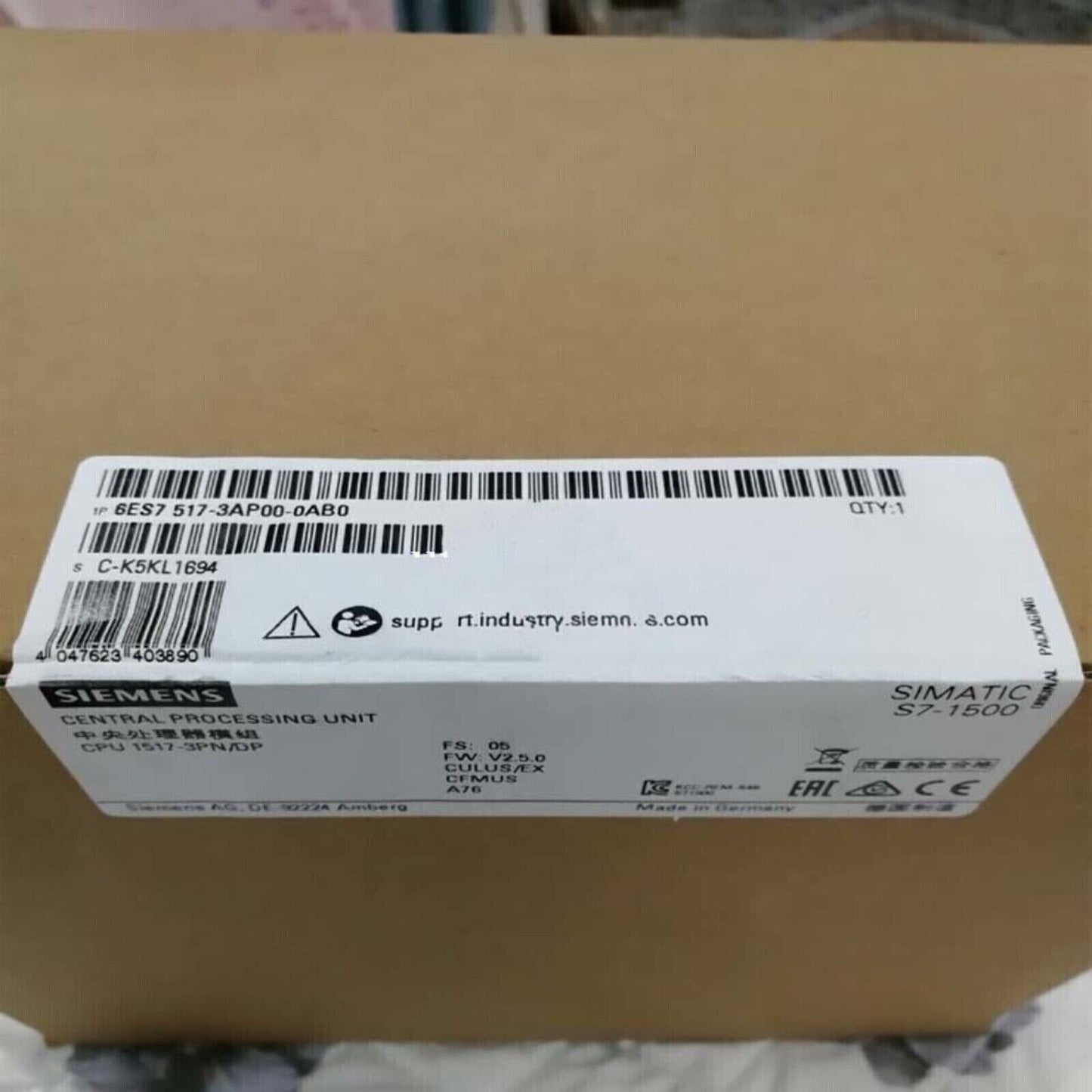 Siemens SIMATIC S7-1500 CPU 1517-3 PN/DP controller box, part number 6ES7 517-3AP00-0AB0, Made in Germany.