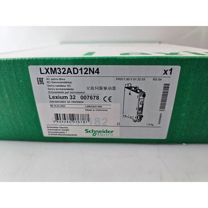 Schneider Electric LXM32AD12N4 Variable Frequency Drive (VFD) on green packaging, servo drive detail.