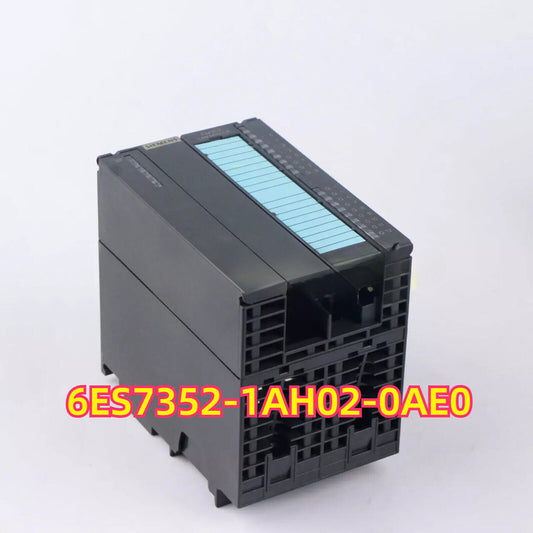 Siemens S7-300 FM 352 Cam Controller. Black and light blue industrial automation PLC module.