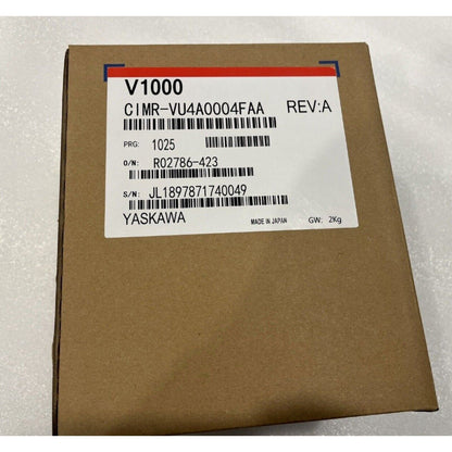 YASKAWA CIMR-VU4A0004FAA Inverter on a cardboard box. New industrial automation part with model information visible.