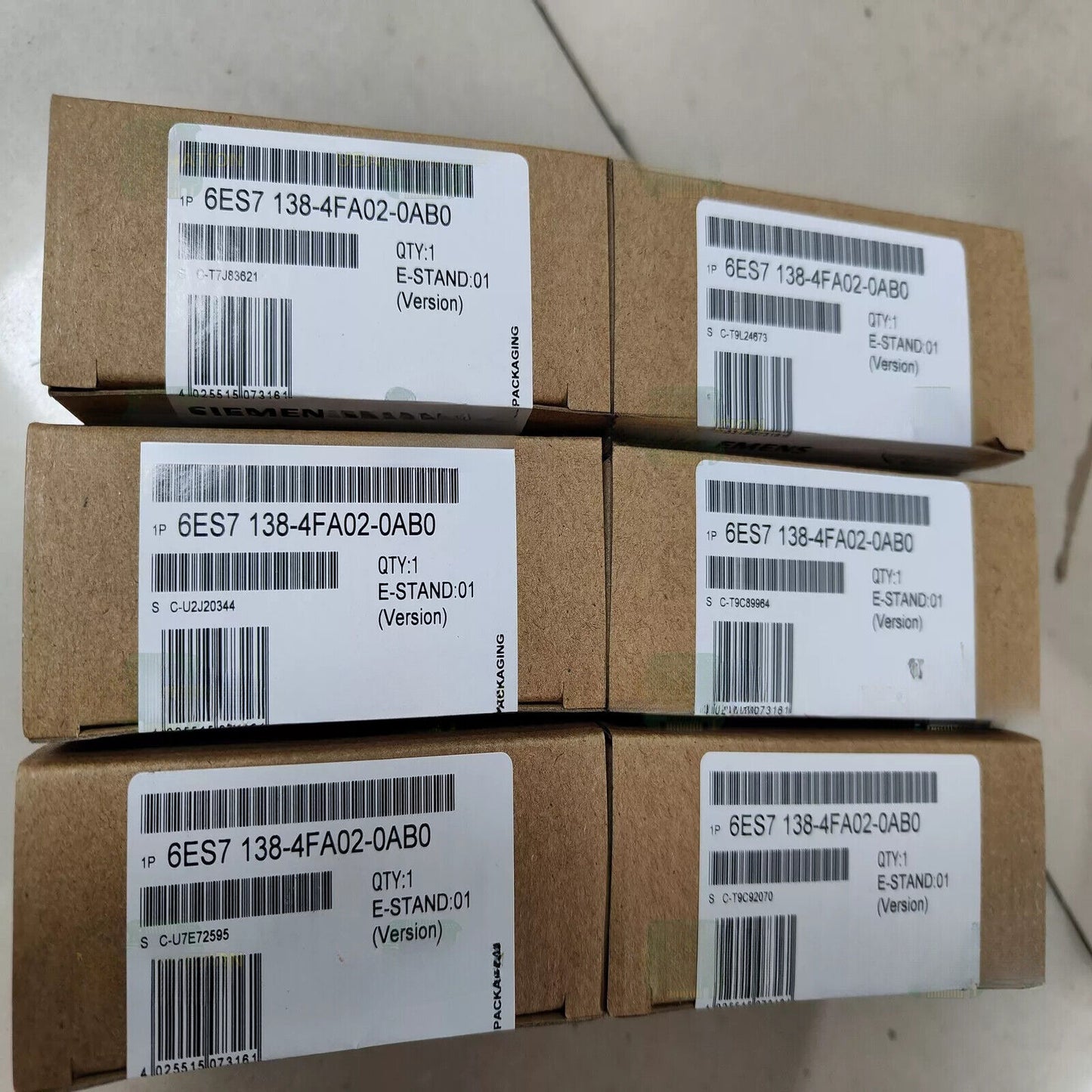 Siemens 6ES7 138-4FA02-0AB0 ET 200S Digital Output Modules in boxes, industrial automation parts.