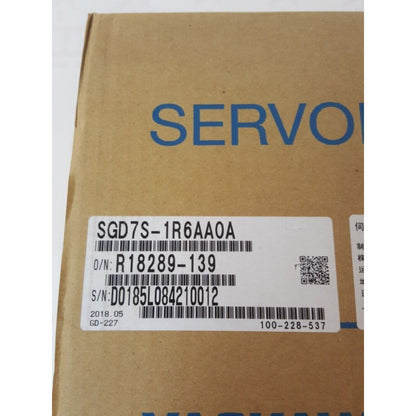 YASKAWA SGD7S-1R6AA0A servo drive packaging. SGD7S1R6AA0A product label and details visible on cardboard box.