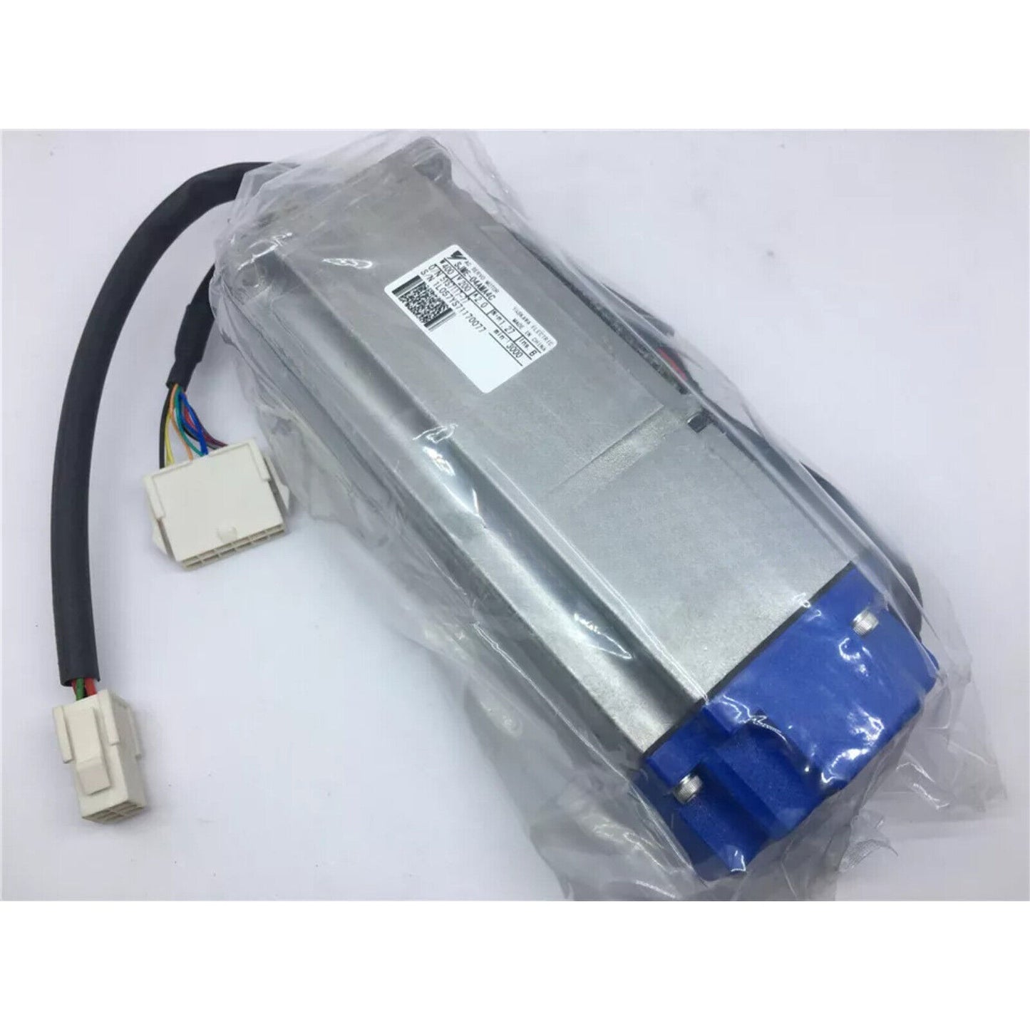 YASKAWA SJME-04AMA4C servo motor, new industrial automation part, silver with blue accents, packaged.