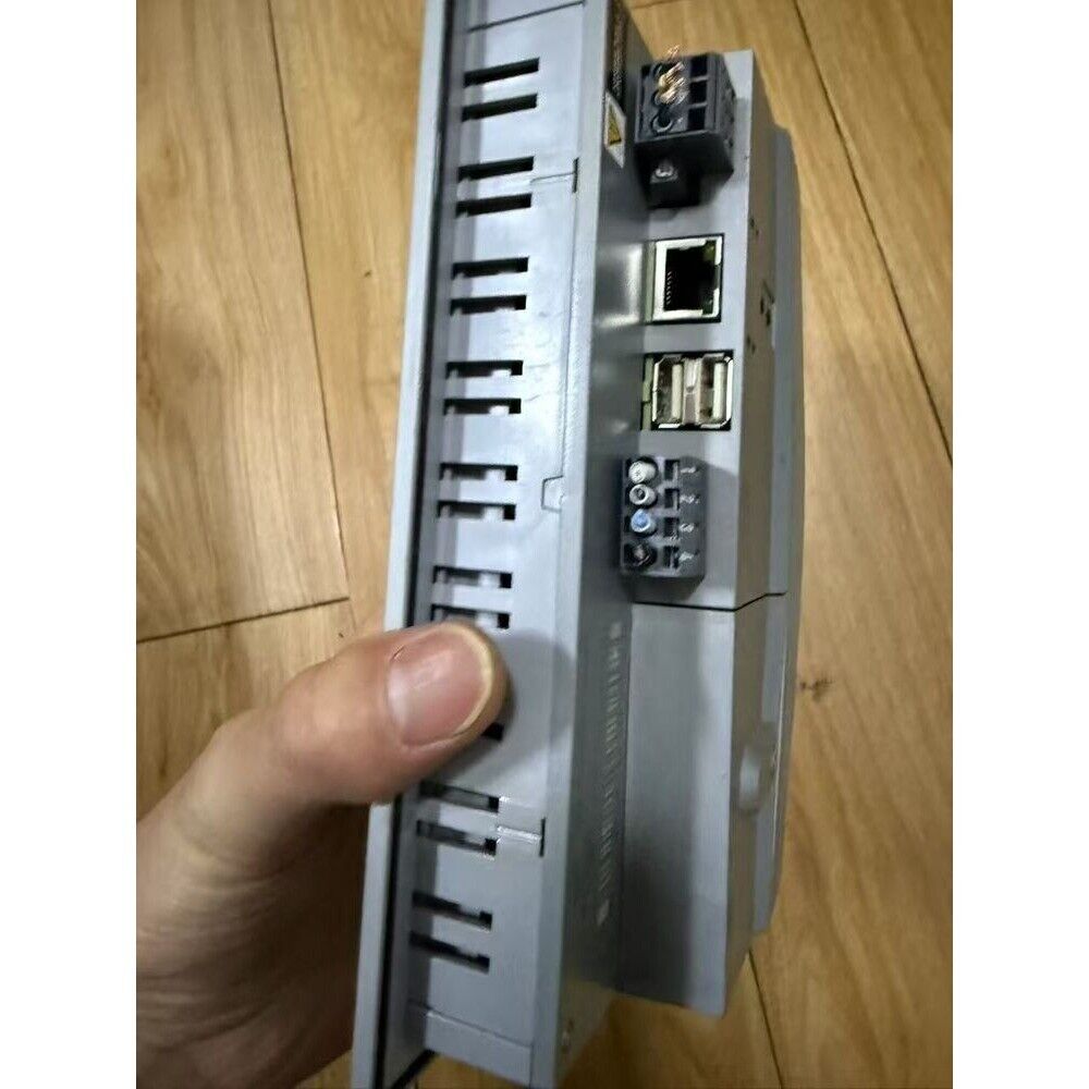 B&R 4PP065.0571-X74F Touch Screen Panel, side view showing ports, gray industrial HMI panel, automation equipment.