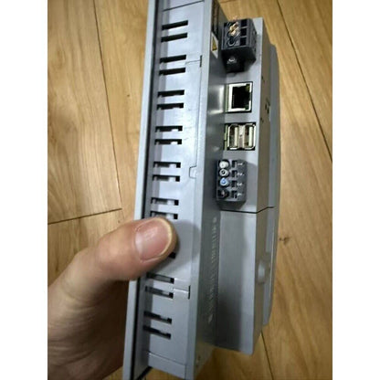 B&R 4PP065.0571-X74F Touch Screen Panel, side view showing ports, gray industrial HMI panel, automation equipment.