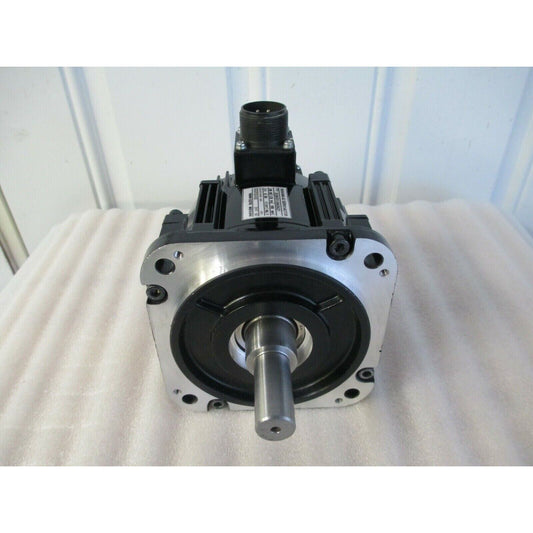 YASKAWA SGMGV-09A3A21 servo motor. Black, silver industrial automation equipment for sale.
