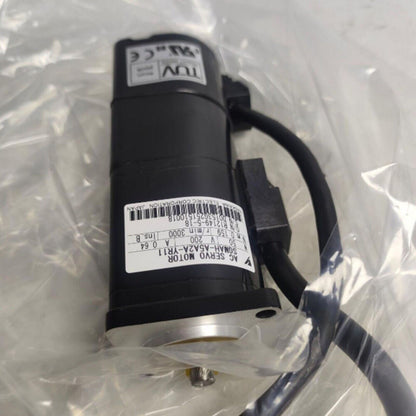 Yaskawa SGMAH-A5A2A-YR11 AC servo motor, black body with label, new industrial automation part.