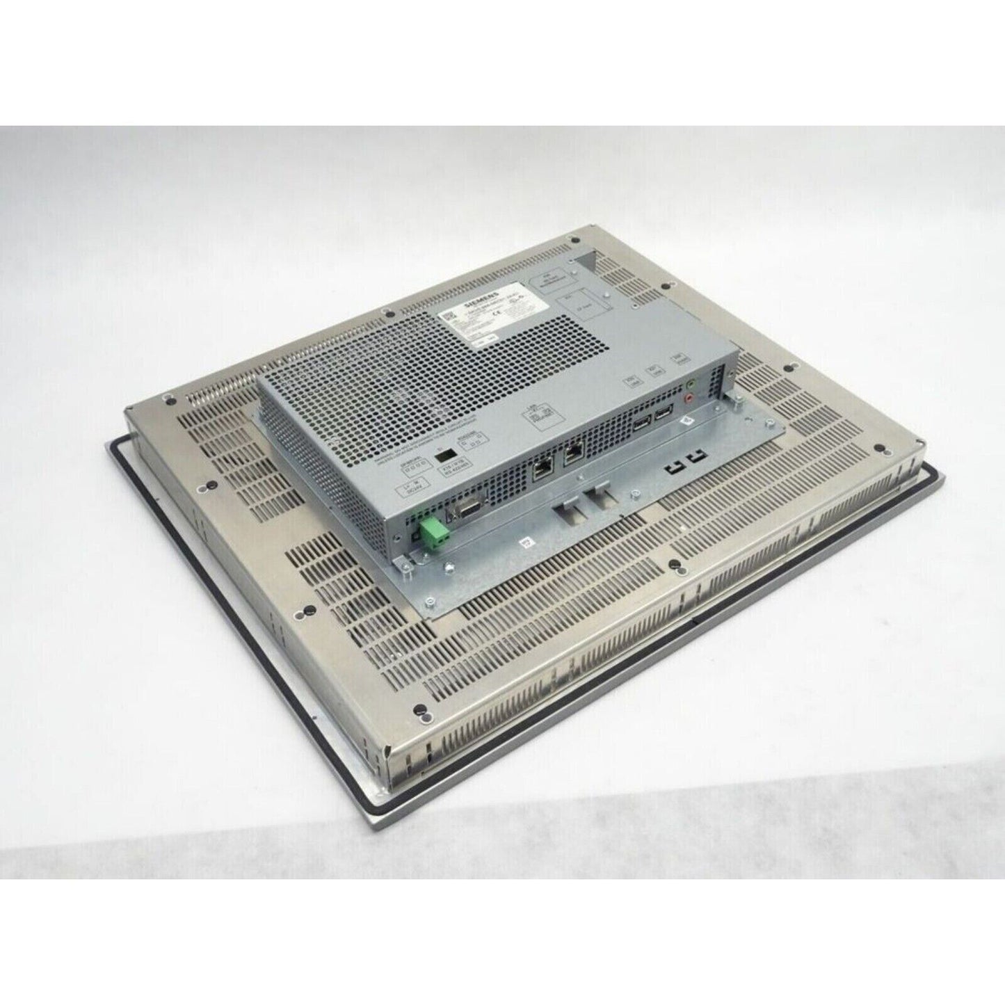 Siemens SIMATIC HMI panel back with metal enclosure, industrial automation equipment, grey