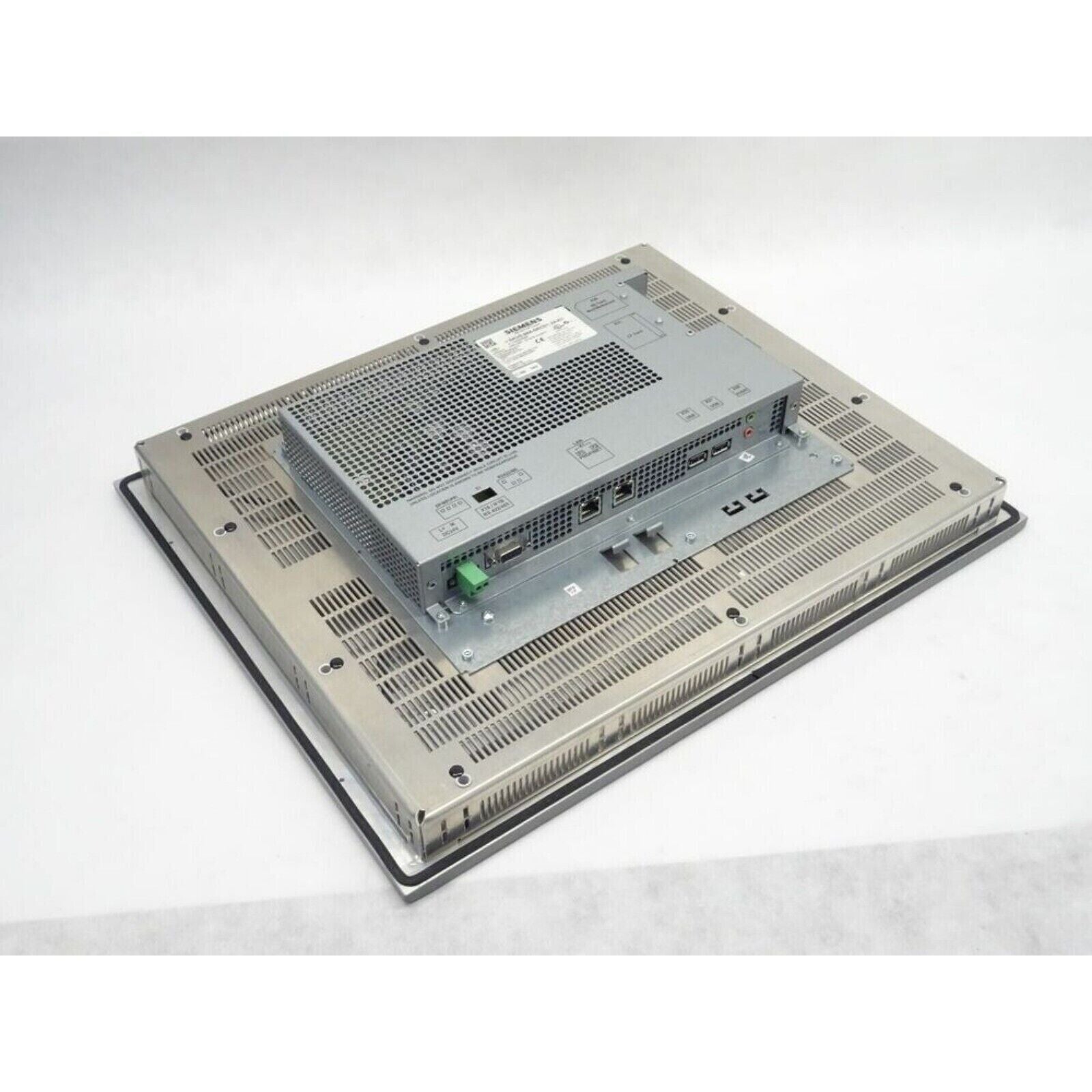 Siemens SIMATIC HMI panel back with metal enclosure, industrial automation equipment, grey