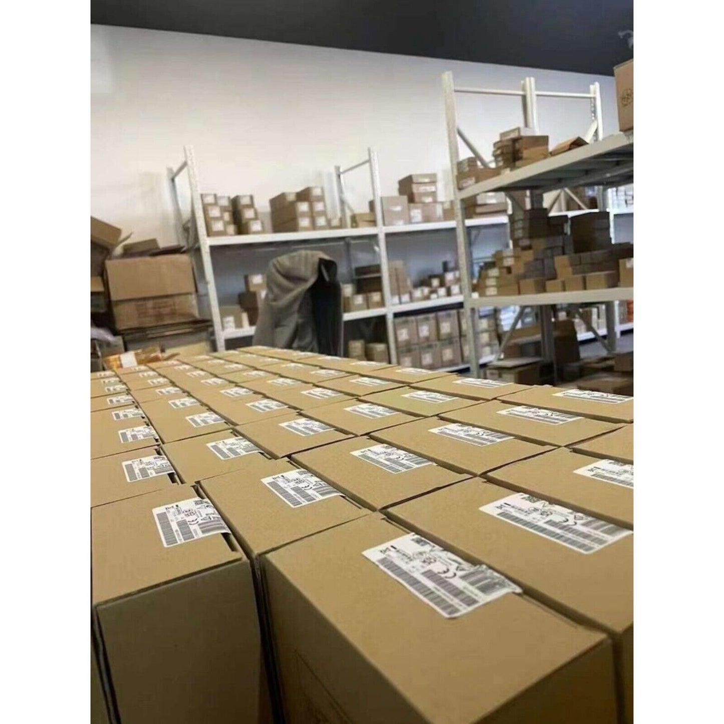 Industrial Automation Parts Warehouse. Boxes of Siemens products ready to ship.