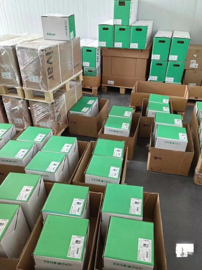 Schneider Electric PLC modules in warehouse, ready for shipping, fast delivery.