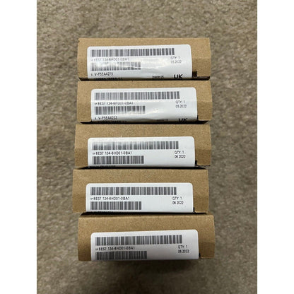 Siemens 6ES7 134-6HD01-0BA1 ET 200SP Analog Input Module boxes, industrial automation parts, multiple units in stock.