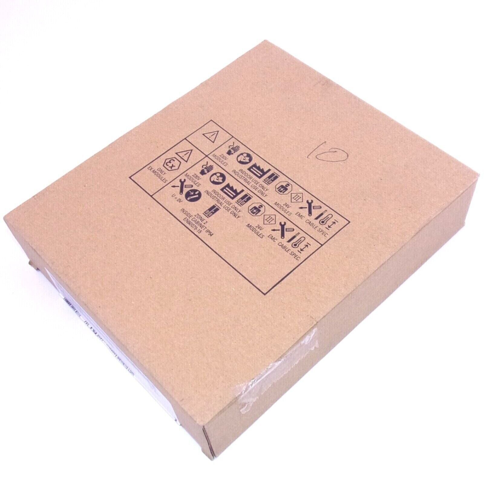 Siemens S7-1500 module packaging box with symbols, industrial automation component, safety labels.