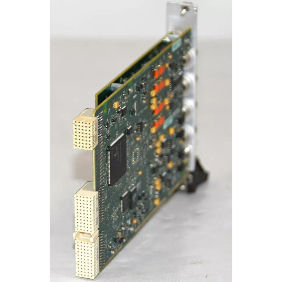 National Instruments PXI-4461 data acquisition module, green circuit board with white connectors and metal frame