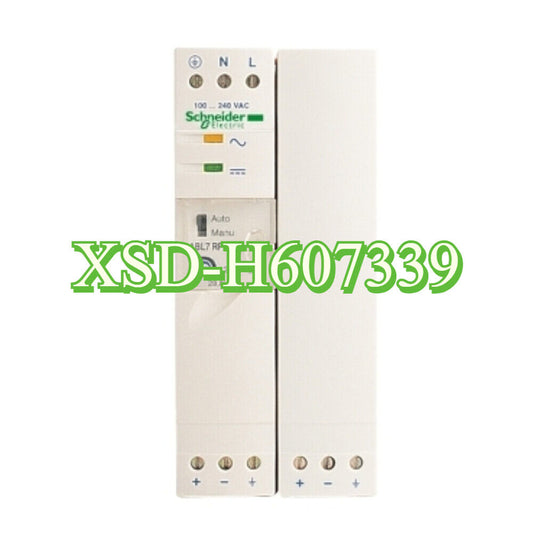 Schneider Electric XSD-H607339 I/O module, white casing with green text.