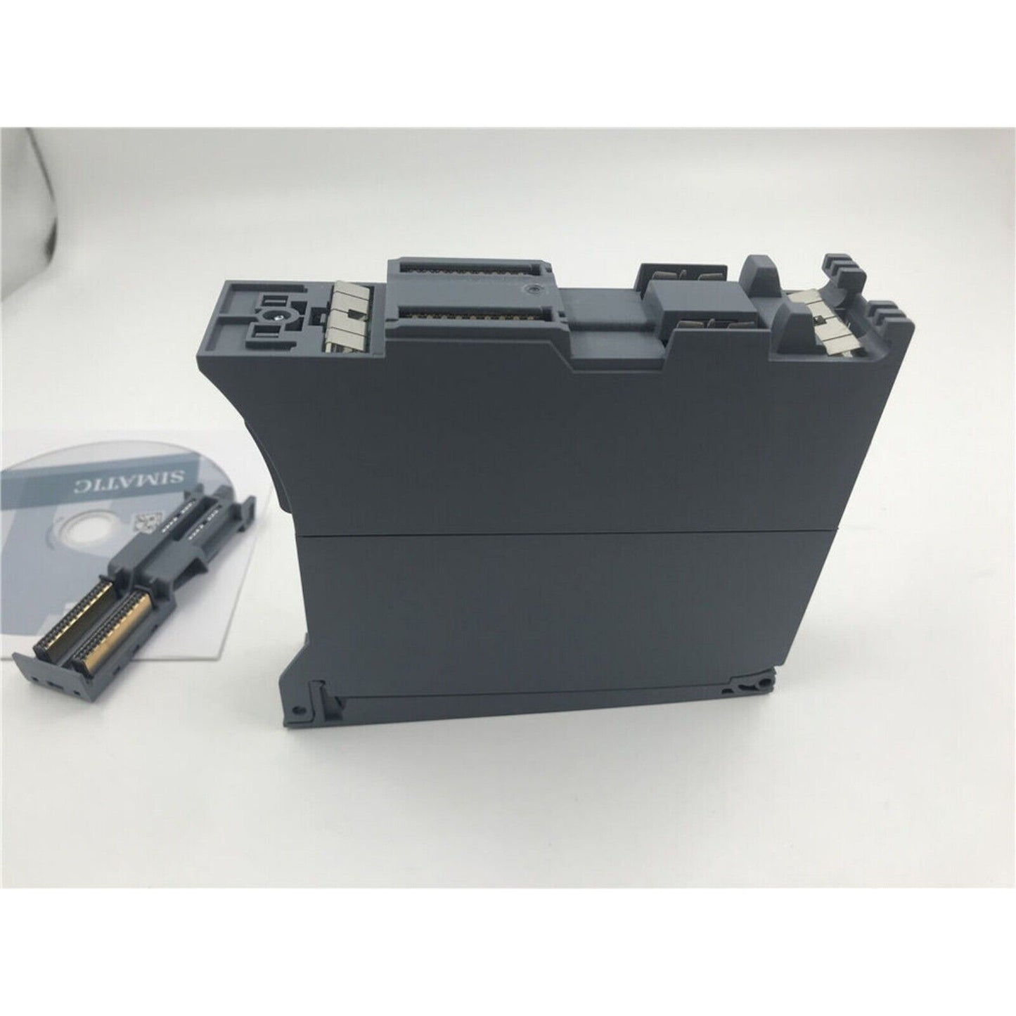 Siemens SCALANCE X-350 industrial Ethernet switch, dark gray, with SIMATIC software disk, network module.