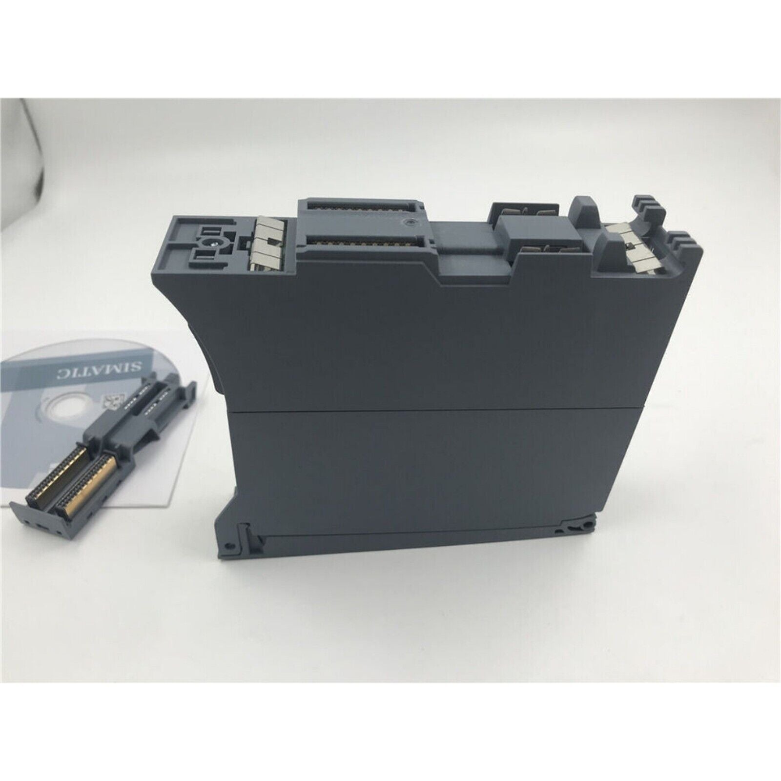 Siemens SCALANCE X-350 industrial Ethernet switch, dark gray, with SIMATIC software disk, network module.