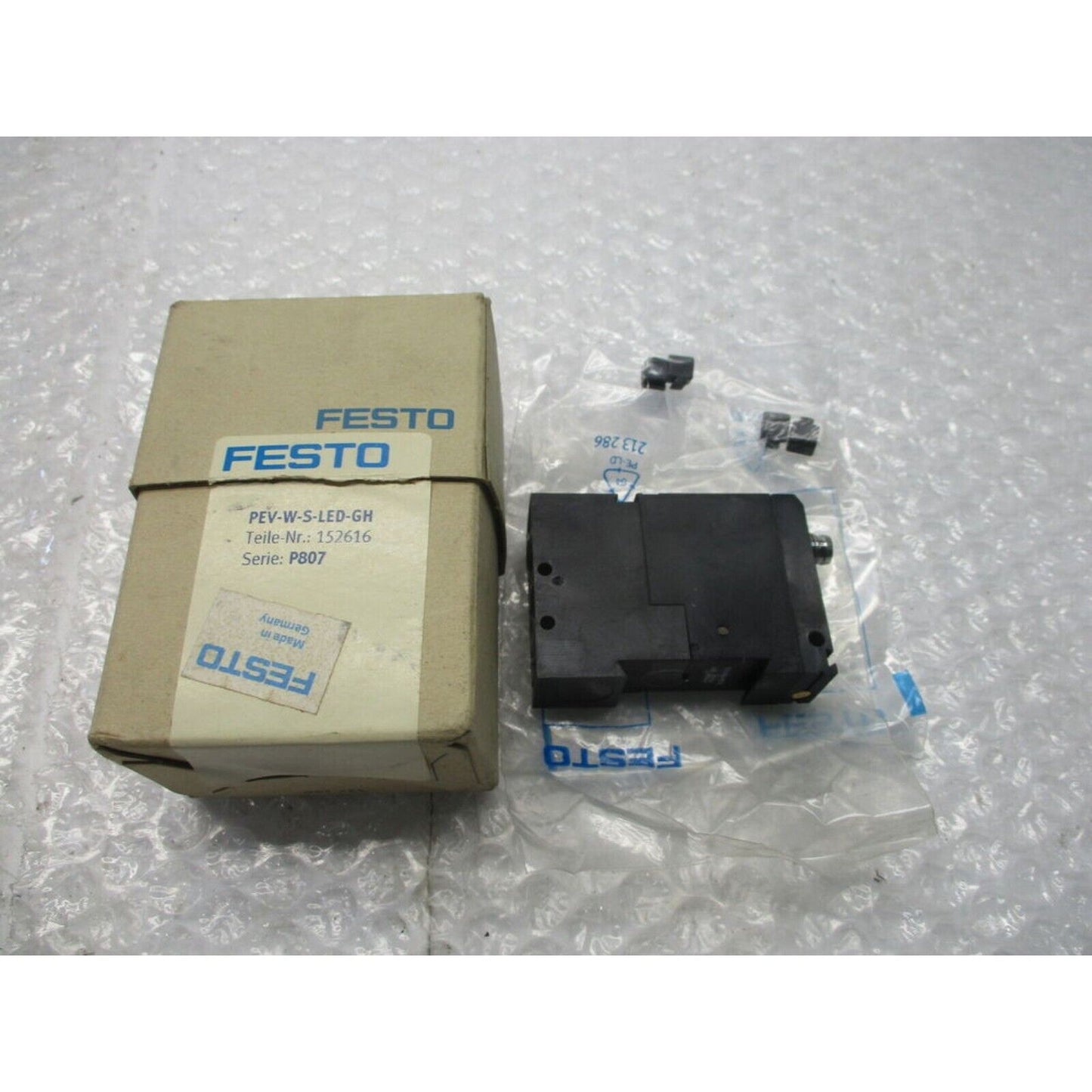 Festo PEV-W-S-LED-GH controller, industrial automation part, product number 152616, Made in Germany.