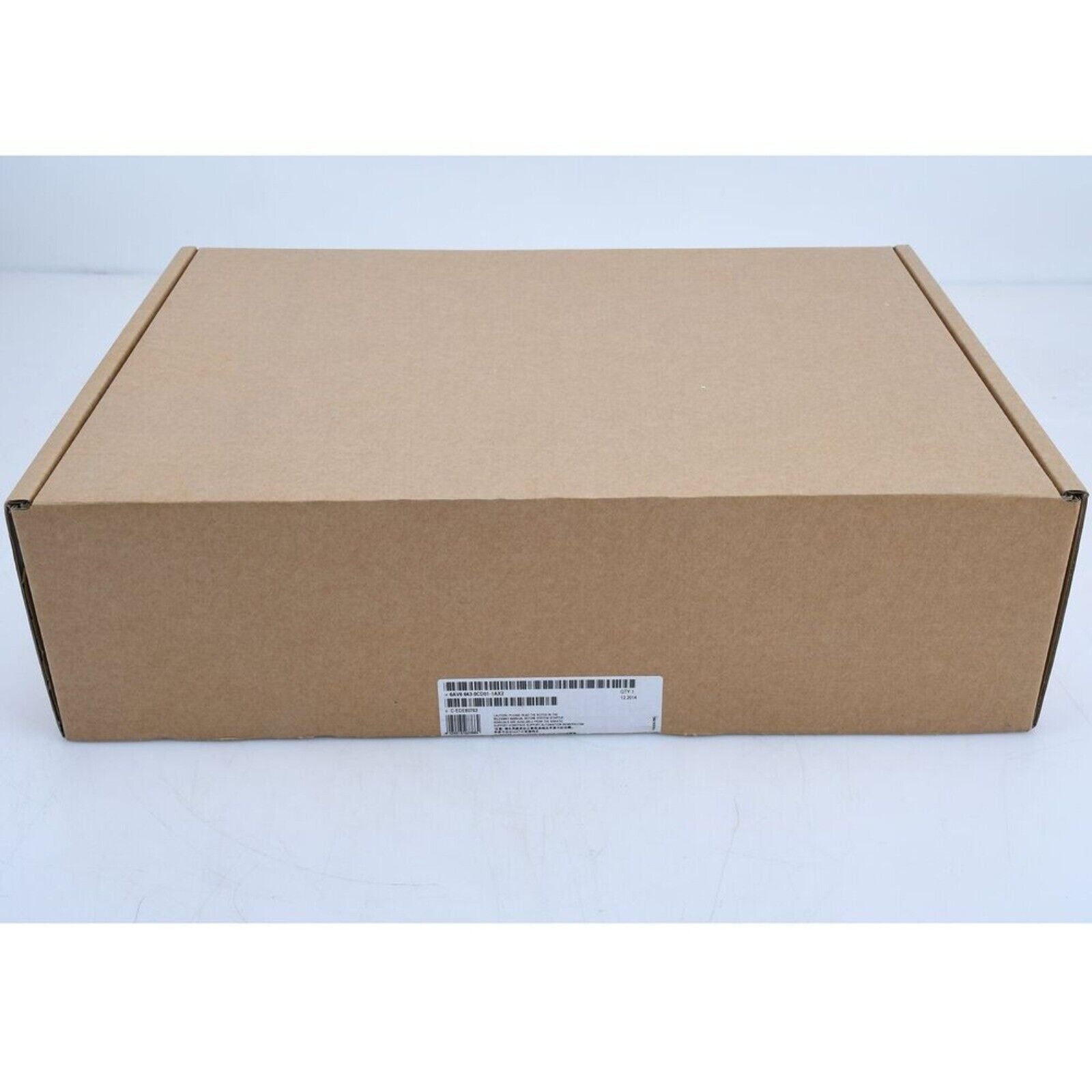 Siemens PLC product box, model 6AV6 643-0CD01-1AX2. Industrial automation part