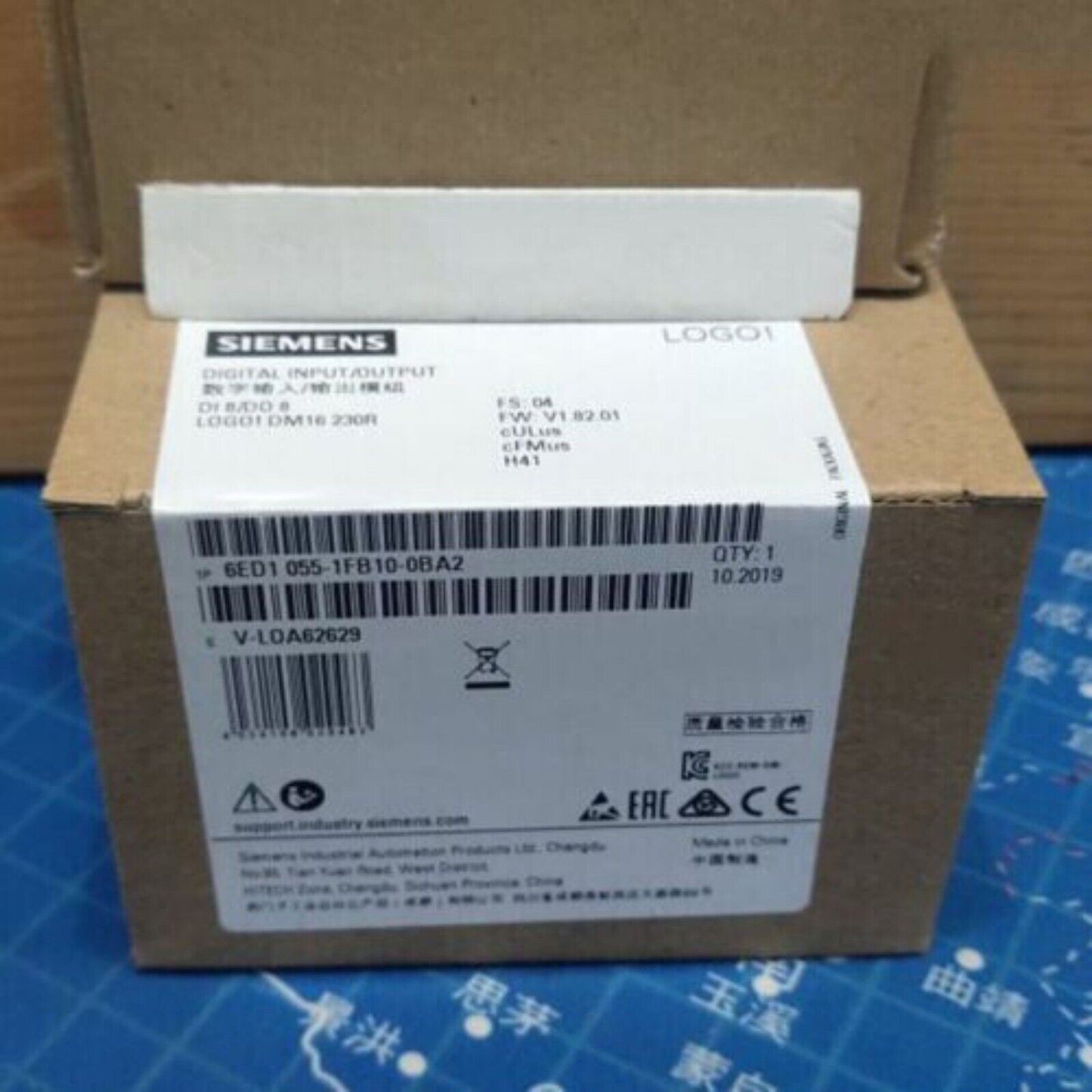 Siemens LOGO! DM16 230R expansion module box, 6ED1055-1FB10-0BA2, for industrial automation.