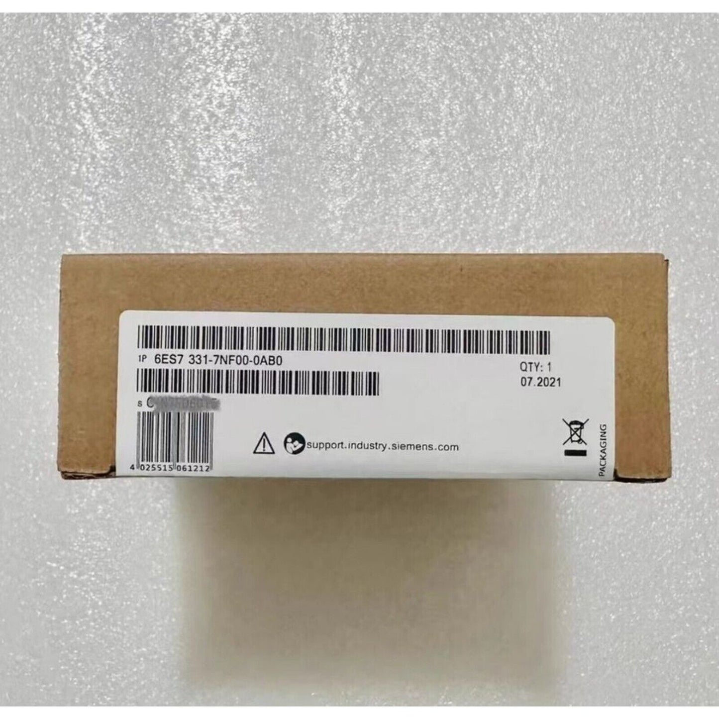 Siemens SIMATIC S7-300 6ES7331-7NF00-0AB0 analog input module box, product packaging with barcode and model info.