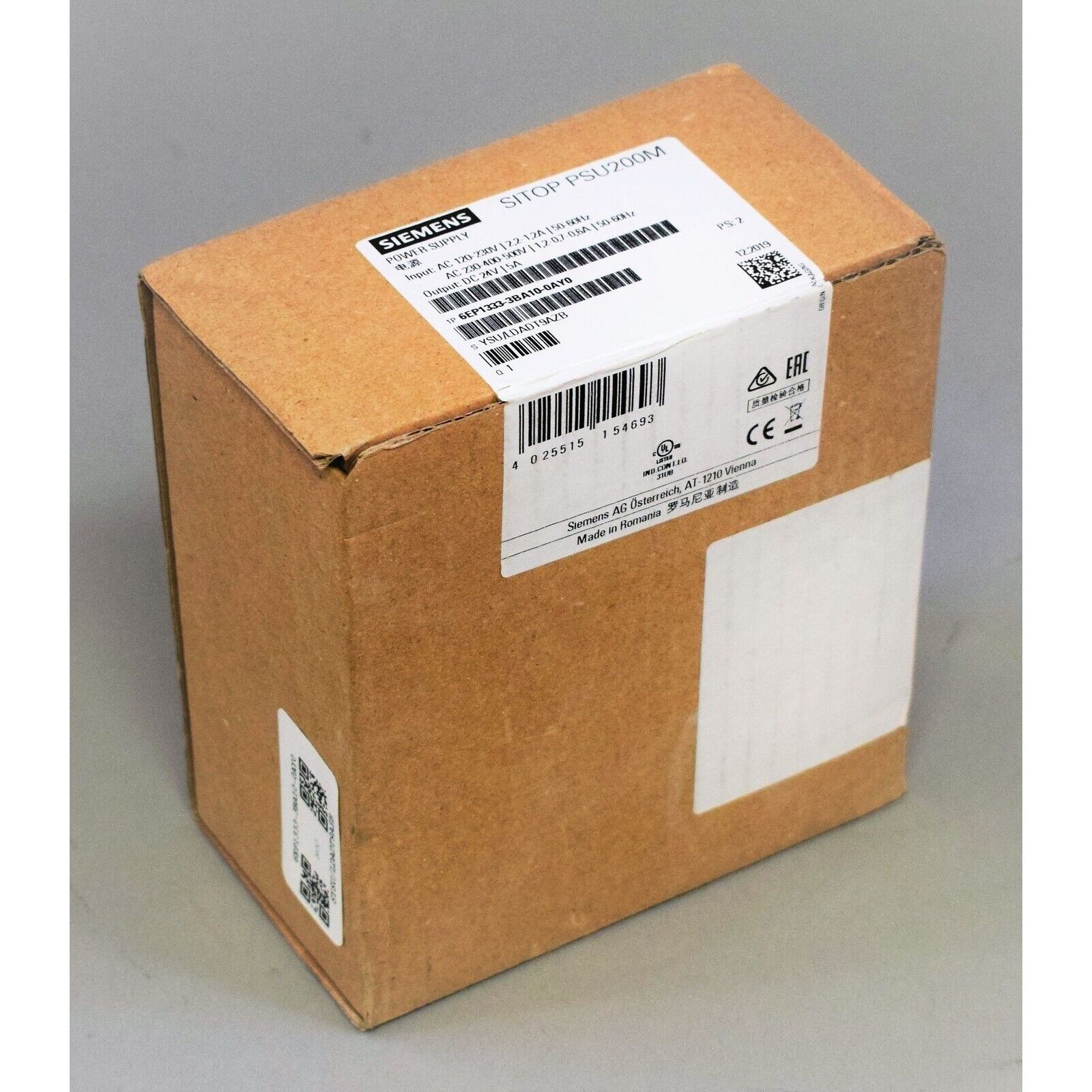 Siemens SITOP PSU200M power supply box. Brown cardboard packaging with product label.