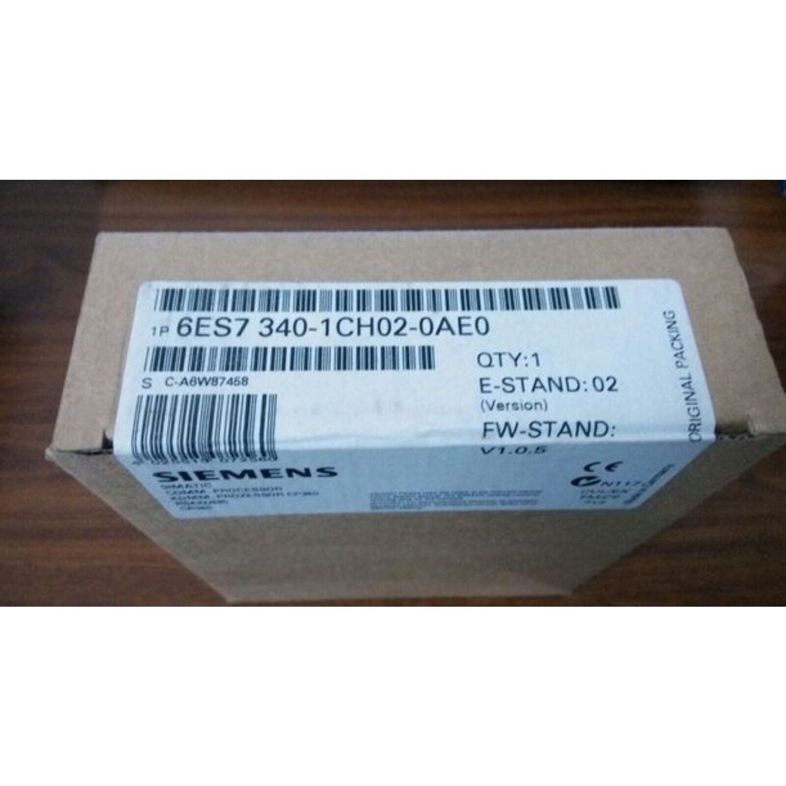 Siemens SIMATIC S7-300 CP 340 PLC Module box, 6ES7 340-1CH02-0AE0, industrial automation part, original packaging.