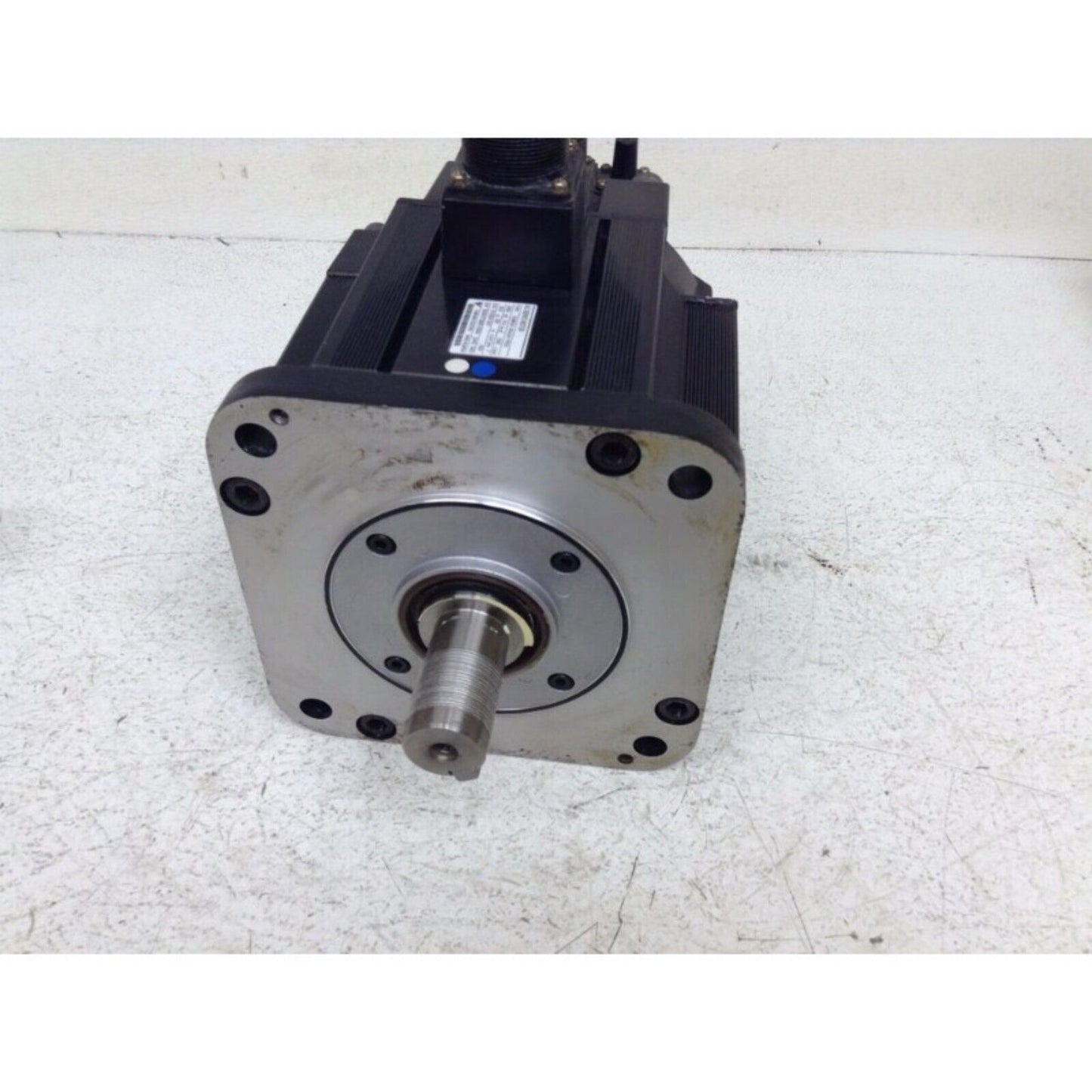 Yaskawa SGMGH-30A2A-YR35 servo motor. Industrial black motor with silver output shaft and label.