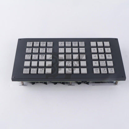 FANUC A02B-0303-C231 Operation panel key with buttons for auto, edit, and other functions.