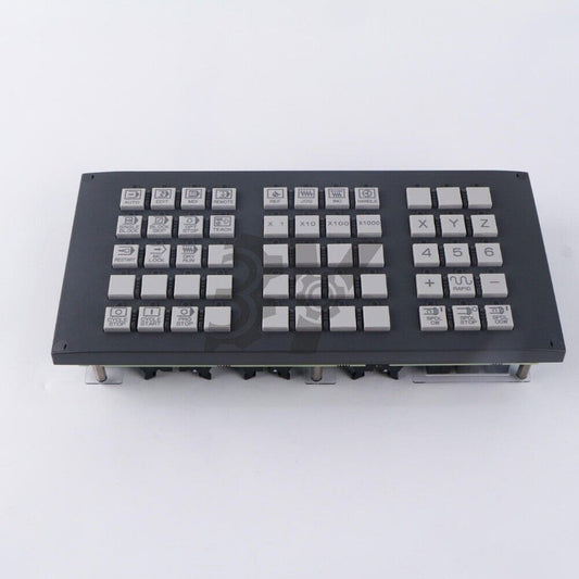 FANUC A02B-0303-C231 Operation panel key with buttons for auto, edit, and other functions.