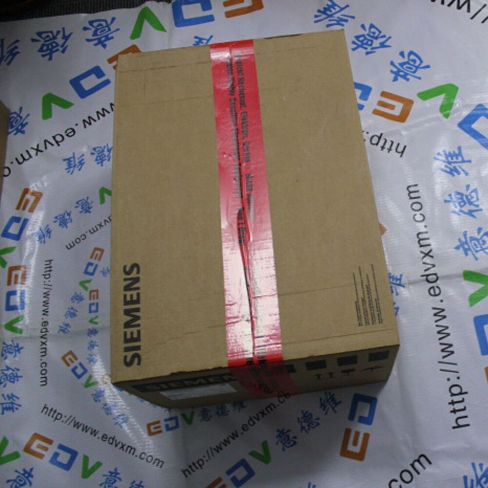 Siemens SINAMICS S120 Active Line Module box, industrial automation equipment, sealed with red tape, SIEMENS logo visible.