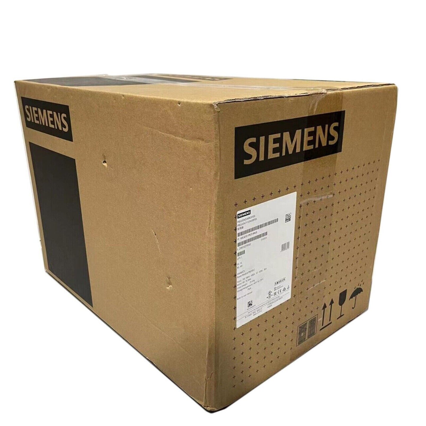 Siemens SINAMICS G120 Power Module box. Industrial automation part packaging, brown cardboard with product label.